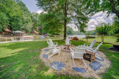 Embrace the outdoors with this expansive level yard and stunning on The Highlands Course at Lake Arrowhead in Georgia - for sale on GolfHomes.com, golf home, golf lot