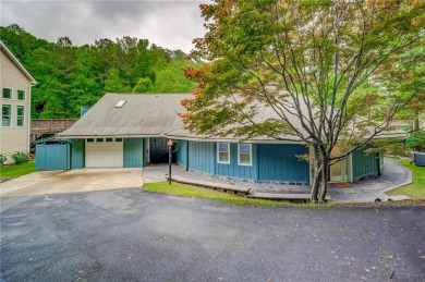 Embrace the outdoors with this expansive level yard and stunning on The Highlands Course at Lake Arrowhead in Georgia - for sale on GolfHomes.com, golf home, golf lot