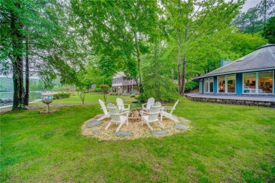 Embrace the outdoors with this expansive level yard and stunning on The Highlands Course at Lake Arrowhead in Georgia - for sale on GolfHomes.com, golf home, golf lot