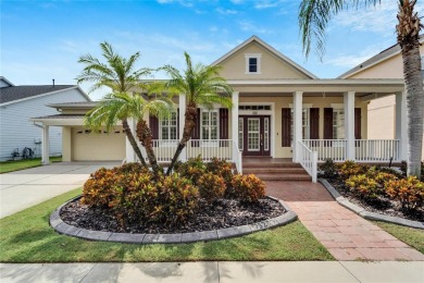 Welcome to 528 Islebay Blvd, a captivating Key West-style home on Apollo Beach Golf and Sea Club in Florida - for sale on GolfHomes.com, golf home, golf lot