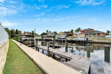 Welcome to 528 Islebay Blvd, a captivating Key West-style home on Apollo Beach Golf and Sea Club in Florida - for sale on GolfHomes.com, golf home, golf lot