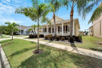 Welcome to 528 Islebay Blvd, a captivating Key West-style home on Apollo Beach Golf and Sea Club in Florida - for sale on GolfHomes.com, golf home, golf lot