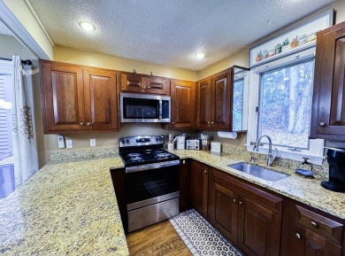 Three bedroom two bath Fairway Village condo in the heart of the on Quechee Club in Vermont - for sale on GolfHomes.com, golf home, golf lot