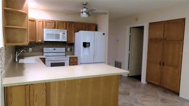 Welcome home! Water views! Wow! This first floor unit has 1,210 on On Top Of The World Golf Course in Florida - for sale on GolfHomes.com, golf home, golf lot