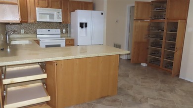 Welcome home! Water views! Wow! This first floor unit has 1,210 on On Top Of The World Golf Course in Florida - for sale on GolfHomes.com, golf home, golf lot