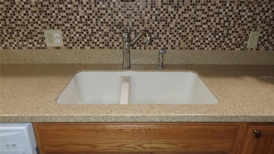 Welcome home! Water views! Wow! This first floor unit has 1,210 on On Top Of The World Golf Course in Florida - for sale on GolfHomes.com, golf home, golf lot