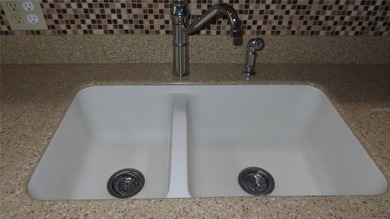 Welcome home! Water views! Wow! This first floor unit has 1,210 on On Top Of The World Golf Course in Florida - for sale on GolfHomes.com, golf home, golf lot