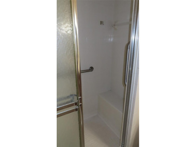 Welcome home! Water views! Wow! This first floor unit has 1,210 on On Top Of The World Golf Course in Florida - for sale on GolfHomes.com, golf home, golf lot