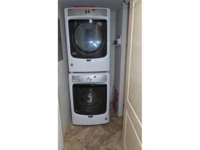 Welcome home! Water views! Wow! This first floor unit has 1,210 on On Top Of The World Golf Course in Florida - for sale on GolfHomes.com, golf home, golf lot