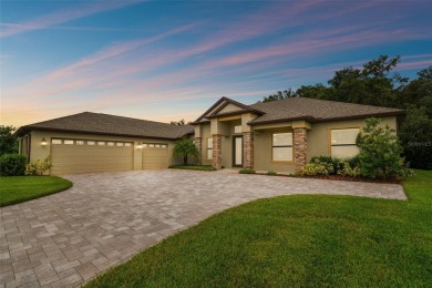 Move in ready 4 beds + 3 baths + 3 car OVERSIZED 35' x 21' side on Lake Jovita Golf and Country Club in Florida - for sale on GolfHomes.com, golf home, golf lot