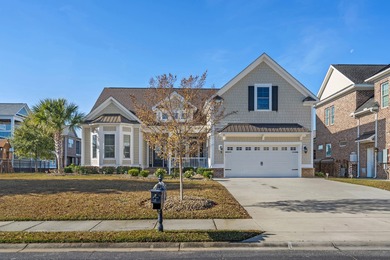 This exquisite single-level home on a pristine lake lot in the on Myrtlewood Golf Course and Club  in South Carolina - for sale on GolfHomes.com, golf home, golf lot