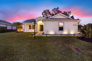 Wake up to panoramic views of tranquil lakes and the perfectly on Links At Greenfield Plantation in Florida - for sale on GolfHomes.com, golf home, golf lot