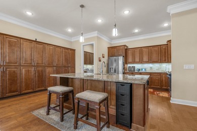 This exquisite single-level home on a pristine lake lot in the on Myrtlewood Golf Course and Club  in South Carolina - for sale on GolfHomes.com, golf home, golf lot