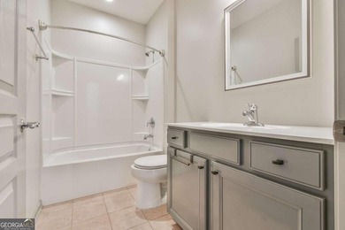 WHAT'S UNIQUE ABOUT THIS HOME: This home has more cabinetry in on Reunion Golf Club in Georgia - for sale on GolfHomes.com, golf home, golf lot