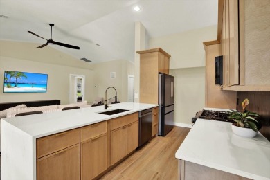 Wake up to panoramic views of tranquil lakes and the perfectly on Links At Greenfield Plantation in Florida - for sale on GolfHomes.com, golf home, golf lot