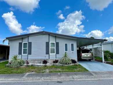 Welcome to Paradise! Paradise island is a 55+ active community on Fairway Village Golf Course in Florida - for sale on GolfHomes.com, golf home, golf lot