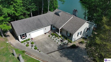 Lakefront Living at Its Finest! This stunning ranch-style home on Doe Valley Country Club in Kentucky - for sale on GolfHomes.com, golf home, golf lot
