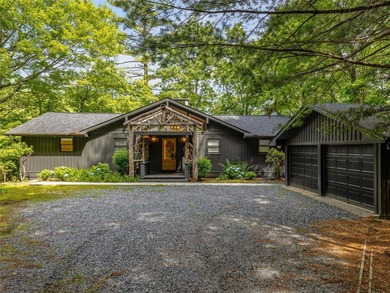 Perfectly positioned along the 18th fairway of Lake Toxaway's on Lake Toxaway Country Club in North Carolina - for sale on GolfHomes.com, golf home, golf lot