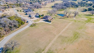 This three bedroom, two bathroom, large three car garage is on Granbury Country Club in Texas - for sale on GolfHomes.com, golf home, golf lot