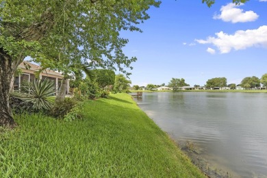 Luxuriously upgraded 3-bed, 2-bath lakefront home with over 1 on Spanish Lakes Fairways in Florida - for sale on GolfHomes.com, golf home, golf lot