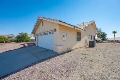 Welcome to your dream home on the 18th hole! This 1,576 sq ft on Desert Lakes Golf Course in Arizona - for sale on GolfHomes.com, golf home, golf lot