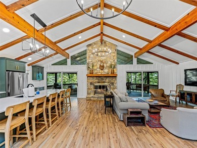 Perfectly positioned along the 18th fairway of Lake Toxaway's on Lake Toxaway Country Club in North Carolina - for sale on GolfHomes.com, golf home, golf lot