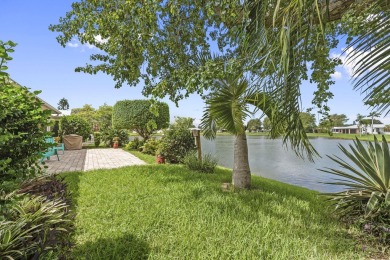 Luxuriously upgraded 3-bed, 2-bath lakefront home with over 1 on Spanish Lakes Fairways in Florida - for sale on GolfHomes.com, golf home, golf lot