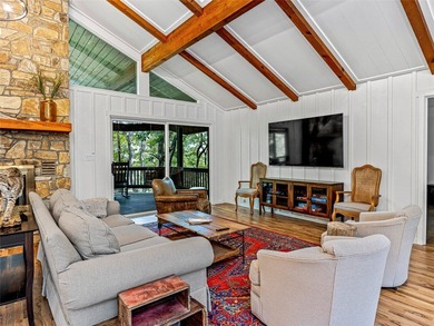 Perfectly positioned along the 18th fairway of Lake Toxaway's on Lake Toxaway Country Club in North Carolina - for sale on GolfHomes.com, golf home, golf lot