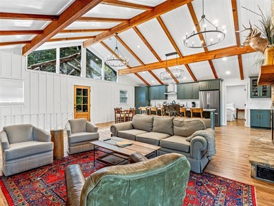 Perfectly positioned along the 18th fairway of Lake Toxaway's on Lake Toxaway Country Club in North Carolina - for sale on GolfHomes.com, golf home, golf lot