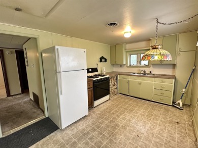 Attention investors! This 3-bedroom, 1-bath home offers great on American Legion Golf Course in Wisconsin - for sale on GolfHomes.com, golf home, golf lot