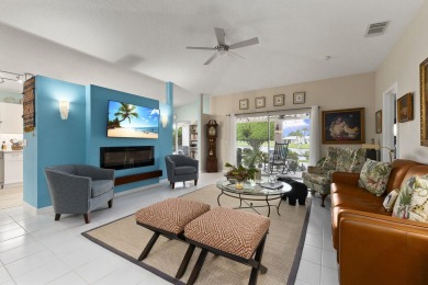 Luxuriously upgraded 3-bed, 2-bath lakefront home with over 1 on Spanish Lakes Fairways in Florida - for sale on GolfHomes.com, golf home, golf lot
