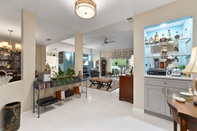 Luxuriously upgraded 3-bed, 2-bath lakefront home with over 1 on Spanish Lakes Fairways in Florida - for sale on GolfHomes.com, golf home, golf lot