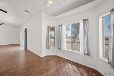 Welcome to your dream home on the 18th hole! This 1,576 sq ft on Desert Lakes Golf Course in Arizona - for sale on GolfHomes.com, golf home, golf lot