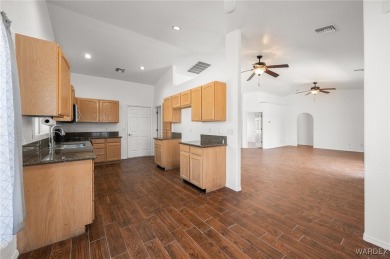 Welcome to your dream home on the 18th hole! This 1,576 sq ft on Desert Lakes Golf Course in Arizona - for sale on GolfHomes.com, golf home, golf lot
