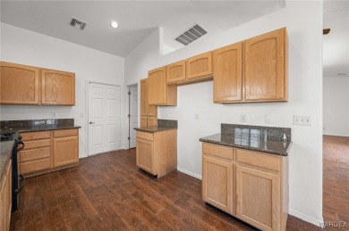 Welcome to your dream home on the 18th hole! This 1,576 sq ft on Desert Lakes Golf Course in Arizona - for sale on GolfHomes.com, golf home, golf lot