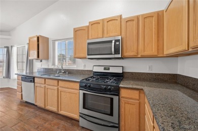 Welcome to your dream home on the 18th hole! This 1,576 sq ft on Desert Lakes Golf Course in Arizona - for sale on GolfHomes.com, golf home, golf lot
