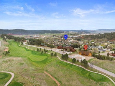 The stunning curb appeal doesn't end there as you enter through on The Golf Club At Devils Tower in Wyoming - for sale on GolfHomes.com, golf home, golf lot