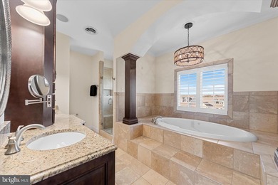 Experience this original Echelon custom-built model home in the on The Peninsula Golf and Country Club in Delaware - for sale on GolfHomes.com, golf home, golf lot