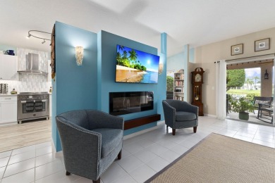 Luxuriously upgraded 3-bed, 2-bath lakefront home with over 1 on Spanish Lakes Fairways in Florida - for sale on GolfHomes.com, golf home, golf lot