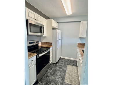 Excellent location, minutes to Pearl ridge shopping Center on Pearl Country Club in Hawaii - for sale on GolfHomes.com, golf home, golf lot