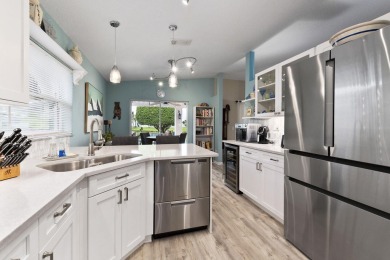Luxuriously upgraded 3-bed, 2-bath lakefront home with over 1 on Spanish Lakes Fairways in Florida - for sale on GolfHomes.com, golf home, golf lot