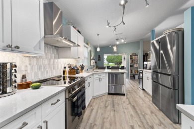 Luxuriously upgraded 3-bed, 2-bath lakefront home with over 1 on Spanish Lakes Fairways in Florida - for sale on GolfHomes.com, golf home, golf lot