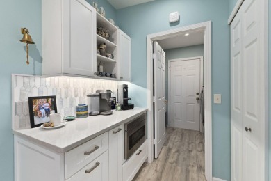 Luxuriously upgraded 3-bed, 2-bath lakefront home with over 1 on Spanish Lakes Fairways in Florida - for sale on GolfHomes.com, golf home, golf lot