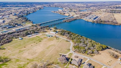 This three bedroom, two bathroom, large three car garage is on Granbury Country Club in Texas - for sale on GolfHomes.com, golf home, golf lot