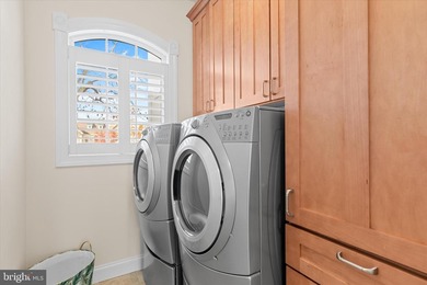 Experience this original Echelon custom-built model home in the on The Peninsula Golf and Country Club in Delaware - for sale on GolfHomes.com, golf home, golf lot