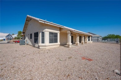 Welcome to your dream home on the 18th hole! This 1,576 sq ft on Desert Lakes Golf Course in Arizona - for sale on GolfHomes.com, golf home, golf lot