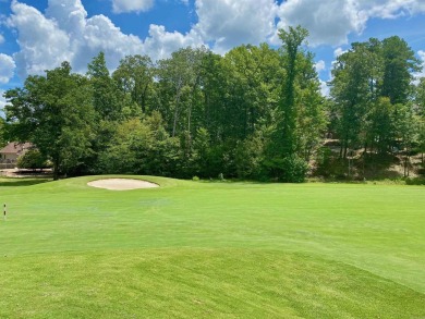 This lot has a near level building area located on a rise given on Ponce De Leon Golf Course in Arkansas - for sale on GolfHomes.com, golf home, golf lot