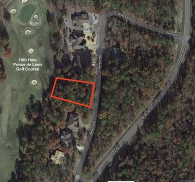 This lot has a near level building area located on a rise given on Ponce De Leon Golf Course in Arkansas - for sale on GolfHomes.com, golf home, golf lot