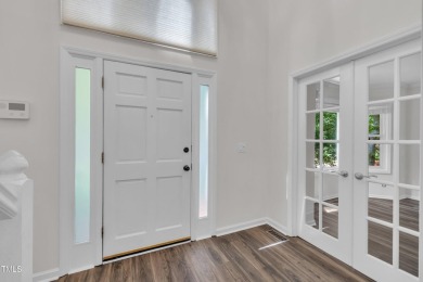 Tucked away in a quiet cul-de-sac of the highly sought-after on Lochmere Golf Club in North Carolina - for sale on GolfHomes.com, golf home, golf lot