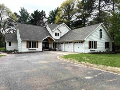 Introducing an exquisite 5-bedroom, 4-bathroom family residence on Timber Ridge Golf Club in Wisconsin - for sale on GolfHomes.com, golf home, golf lot